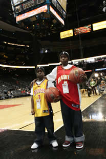 JAJF kids at pro basketball game treating the families not the cancer 