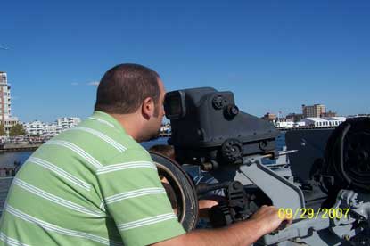 Jack and Jill Foundation man on boat looking through telescope 