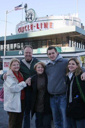 family in front of Circle Line tour boat enjoying a Jack and Jill Foundation WOW experience 