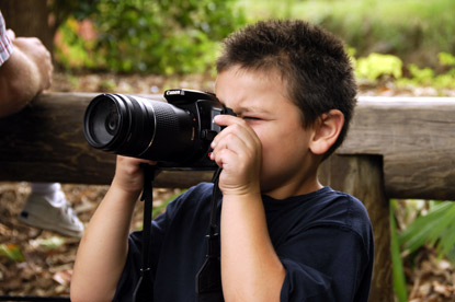 young boy using camera during a Jack and Jill Foundation WOW experience 