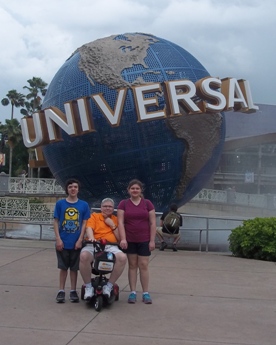 family outside Universal Studios globe enjoying The Power of WOW experience 