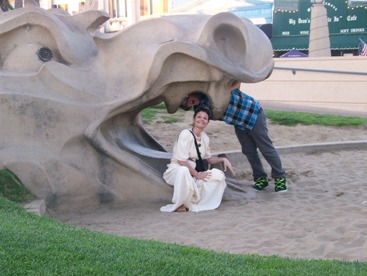 JAJF family posing with dinosaur head  