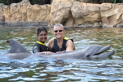 JAJF family swimming with dolphins taking a late stage cancer timeout 