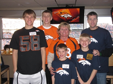 JAJF family at Denver Bronco's football game taking a cancer timeout 
