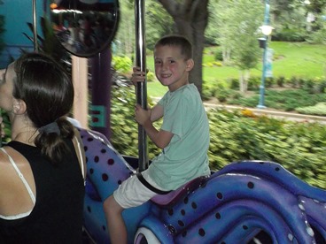 Jack and Jill Foundation boy on carousel taking a late stage cancer timeout 