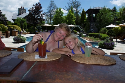 JAJF family enjoying drinks by the pool 