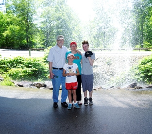 JAJF family in front of water fountain taking a late stage cancer timeout 
