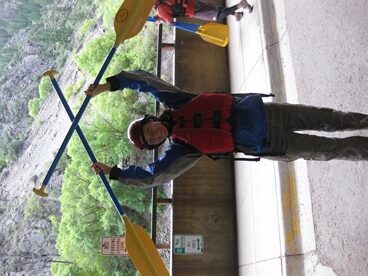 JAJF boy with whitewater rafting oars taking a late stage cancer timeout 