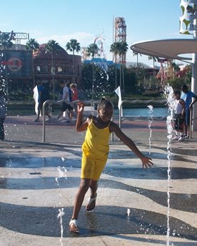 Jack and Jill Foundation young girl enjoying a splash pad fountain 