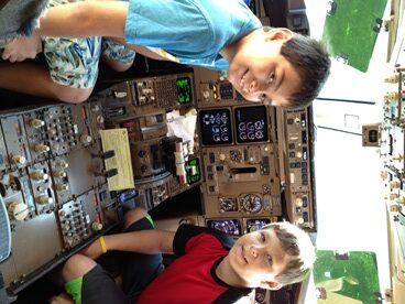 Jack and Jill Foundation boys in cockpit of airplane 