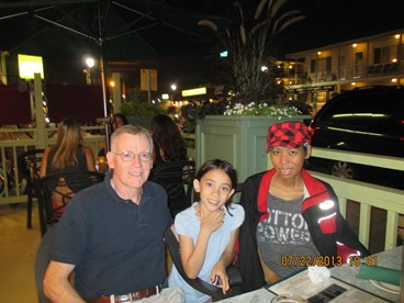 family dining outside taking a timeout from late stage cancer 