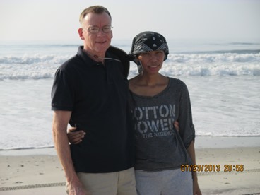 couple on the beach taking a timeout from late stage cancer 
