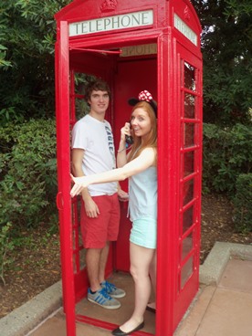 boy and girl in London telephone booth 