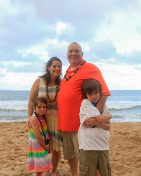 JAJF family on beach with leis the best part of memories is making them 