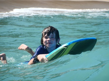 JAJF boy on boogie board the best part of memories is making them 
