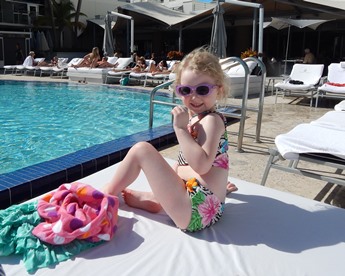 young JAJF girl on lanai poolside 