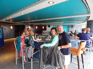 JAJF couple enjoying a cocktail at a bar 