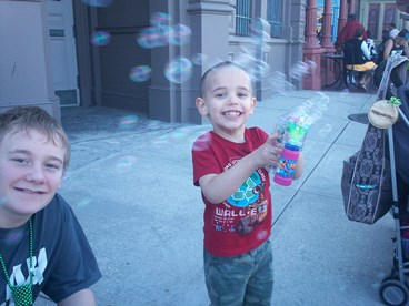 JAJF siblings blowing bubbles the best part of memories is making them 