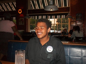 JAJF man in restaurant booth making lasting memories 