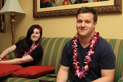 JAJF man and woman on couch with leis 