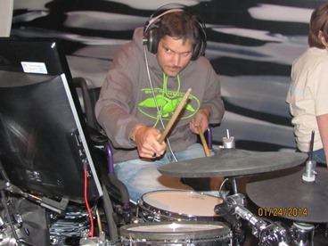 JAJF man playing the drums enjoying a WOW Experience 