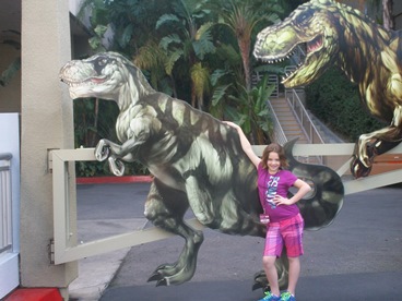 JAJF girl with dinosaur statue treating the families not the cancer 