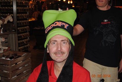 man with Goofy hat making lasting memories 