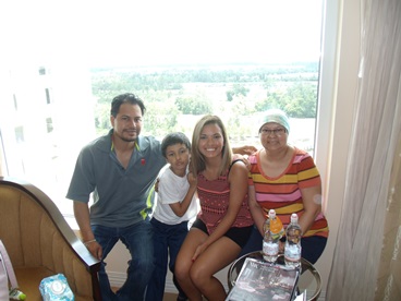 Jack and Jill Foundation family posing by a window during break from late stage cancer 