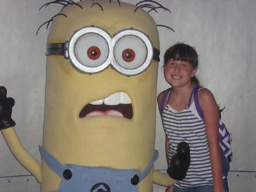 young JAJF girl posing with Minion at Universal Studios 
