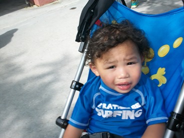 young JAJF boy in stroller on late stage cancer vacation 