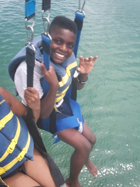 family parasailing during JAJF trip 