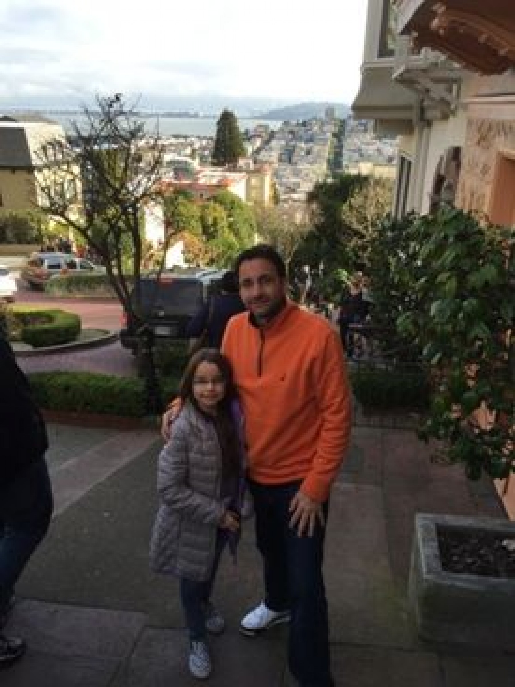 dad and daughter on city street enjoying a JAJF WOW experience 