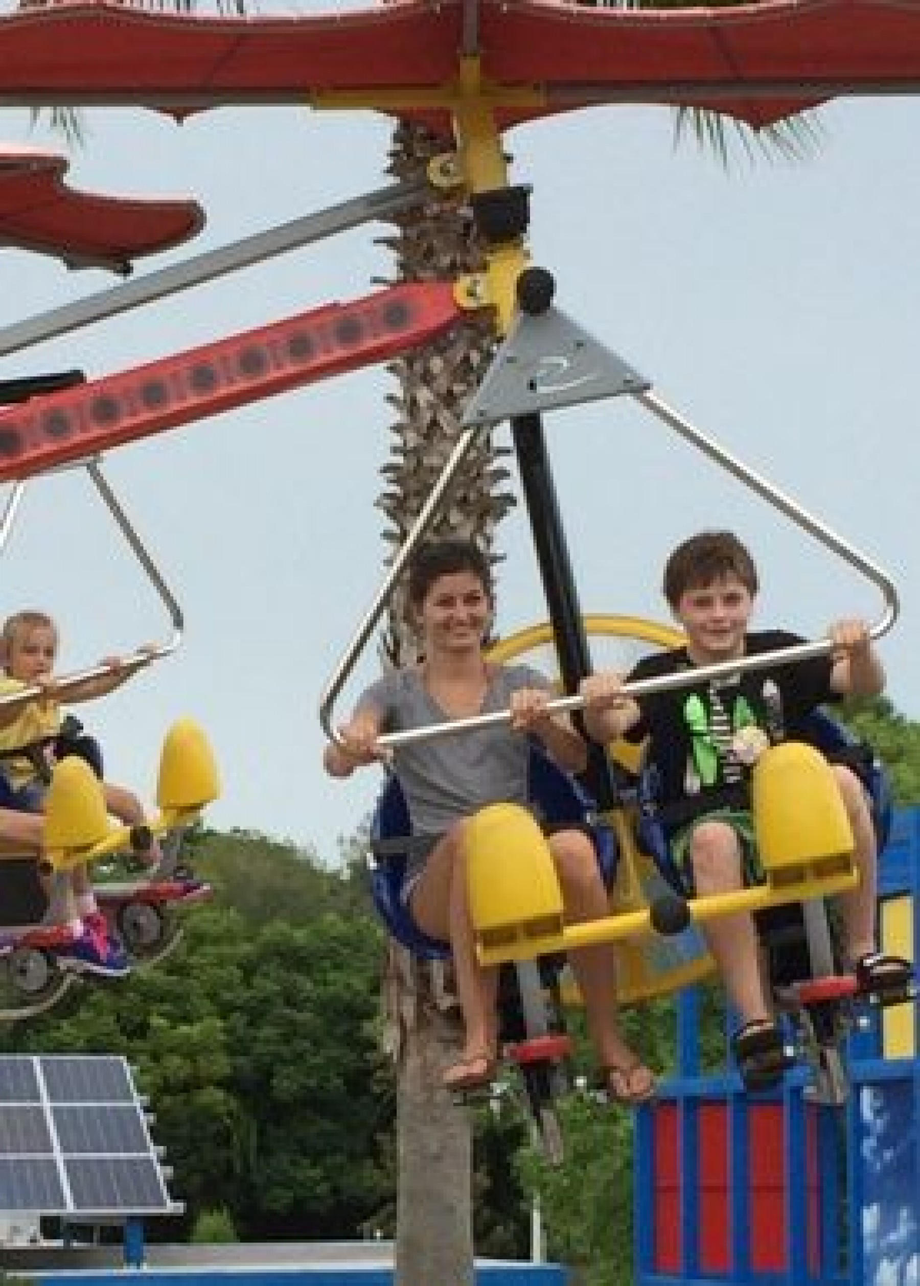 family on theme park ride enjoying a JAJF WOW experience 
