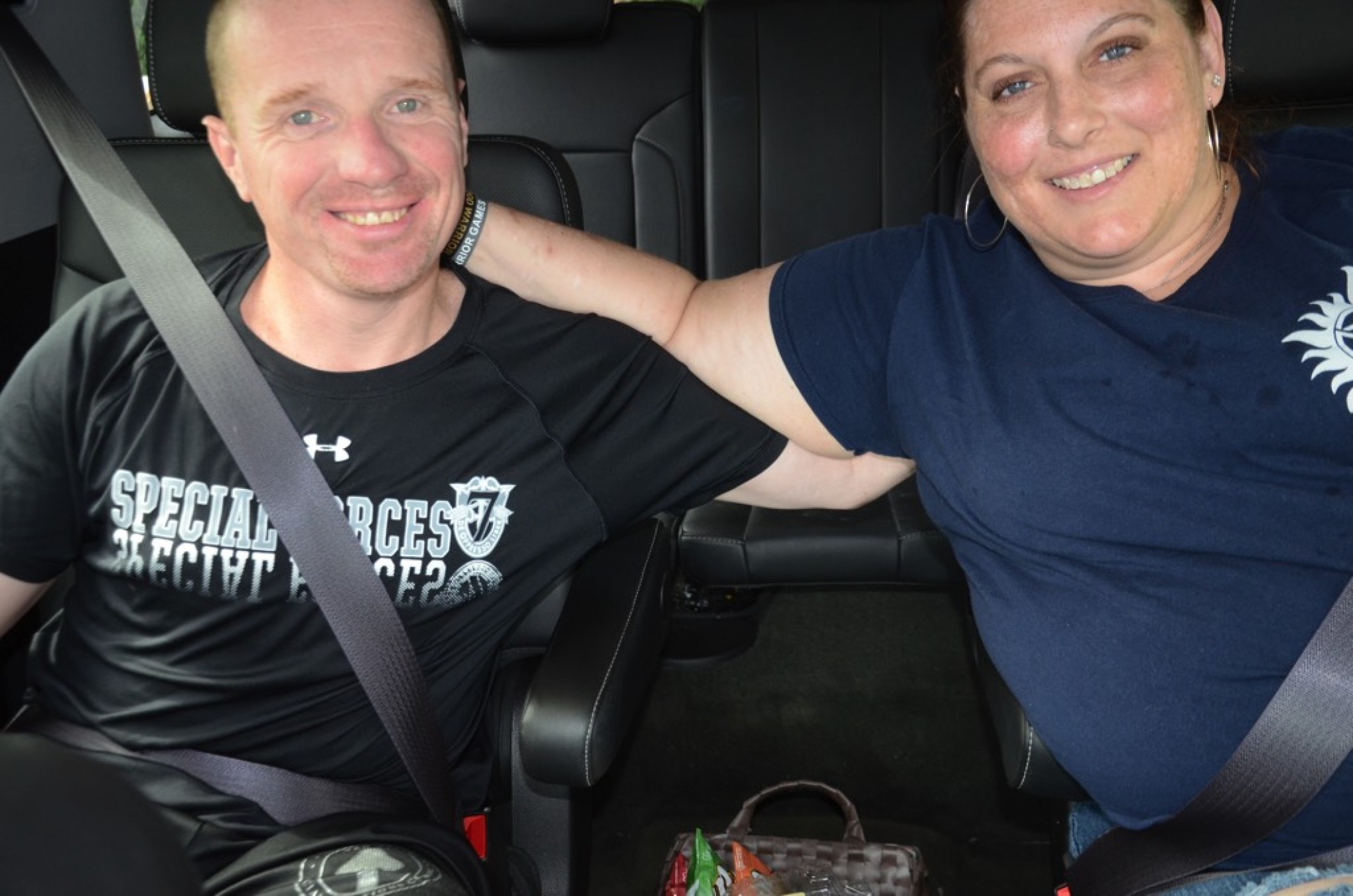 couple sitting in car during a JAJF WOW experience 