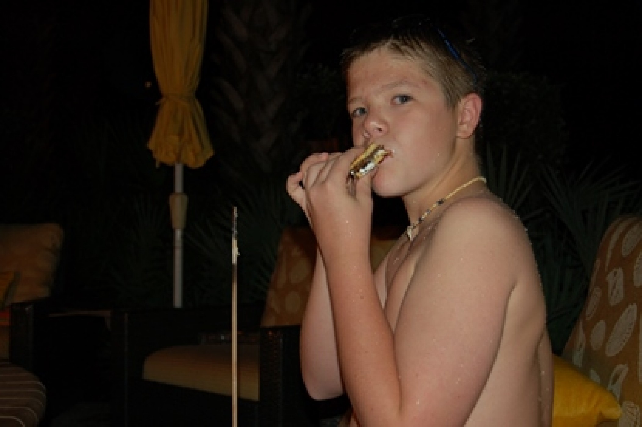 young boy eating a s'more during a JAJF WOW experience 