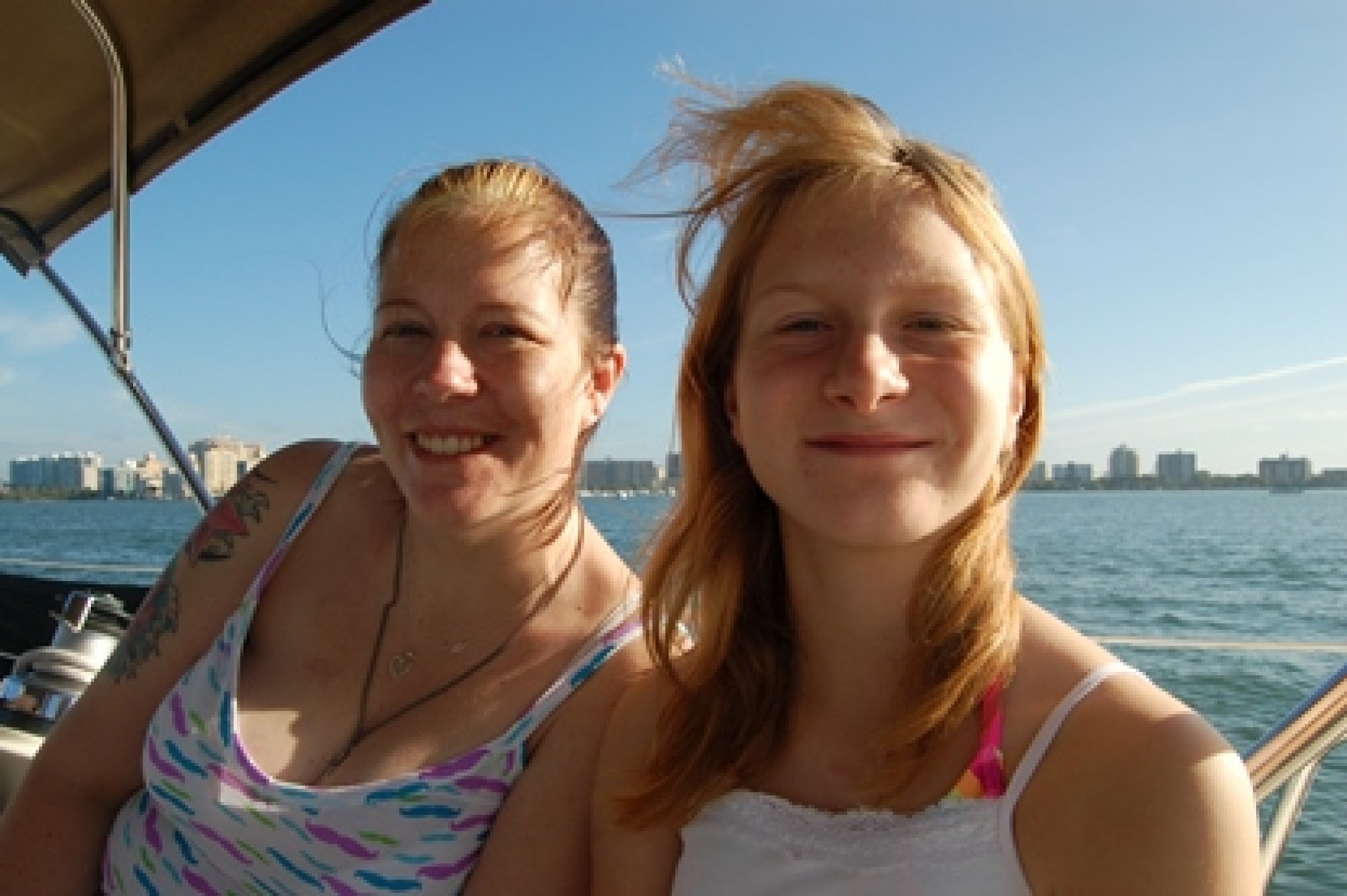 mom and daughter on boating trip during JAJF WOW experience 