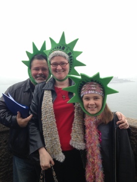 family wearing Statue of Liberty hats during a JAJF WOW experience 