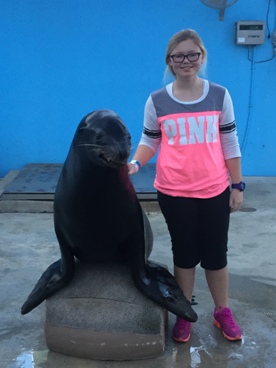 girl with seal during a JAJF WOW experience 