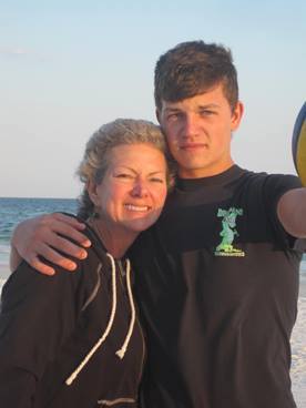 mom and son selfie on the beach during a JAJF cancer timeout 