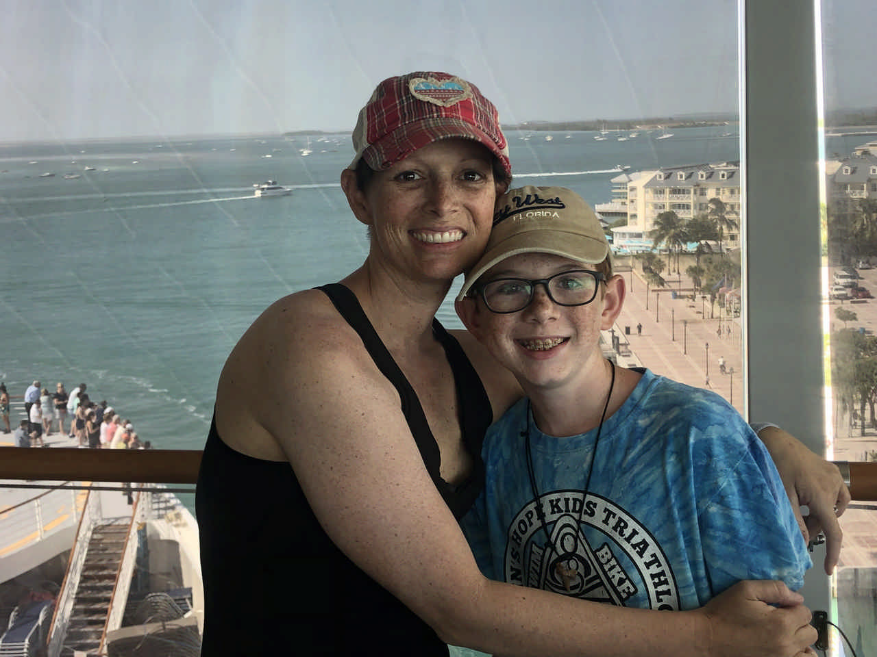 mom and son wearing baseball hats enjoying a JAJF late stage cancer timeout 