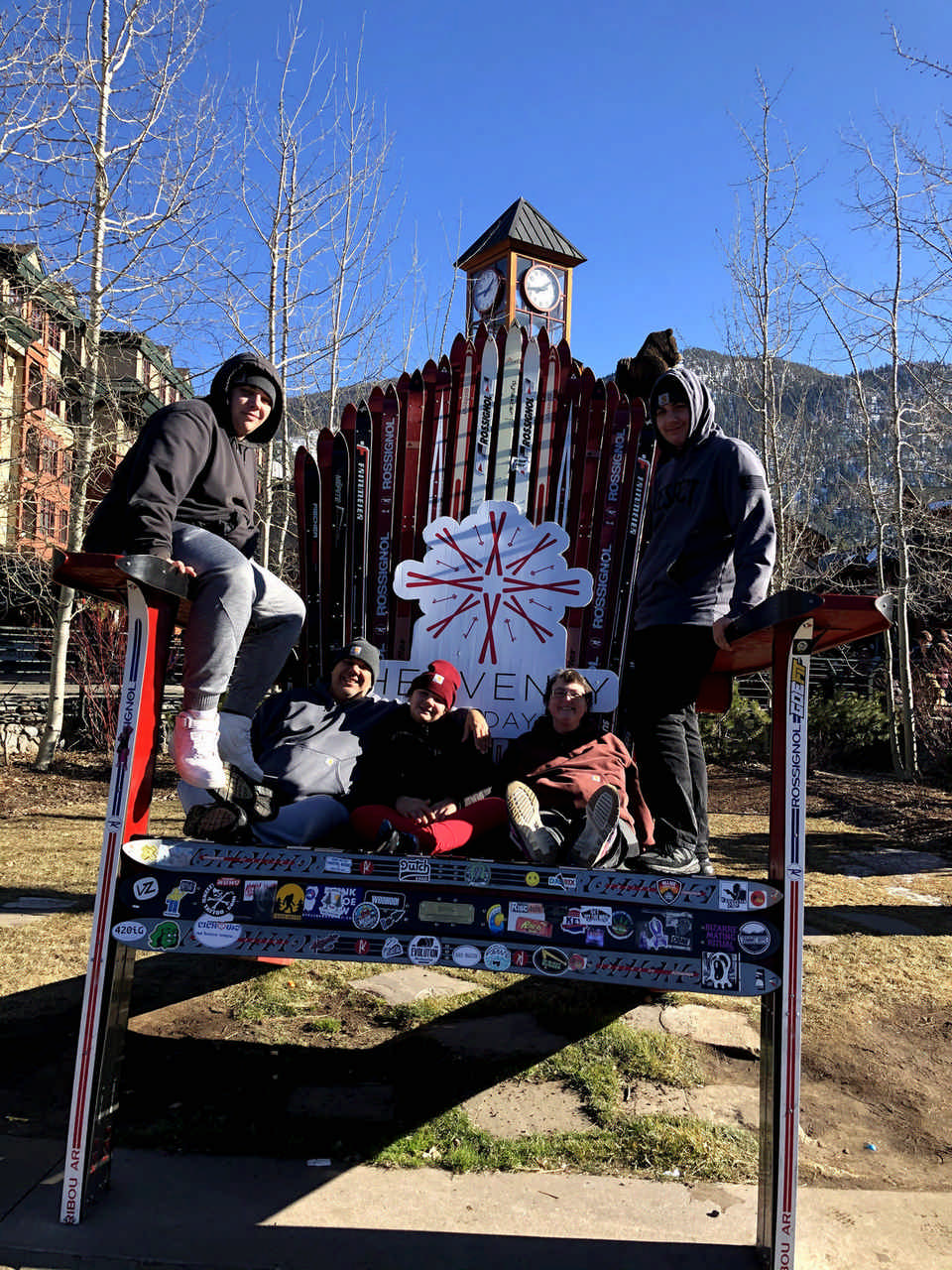 family sitting in a large chair during a JAJF late stage cancer timeout 