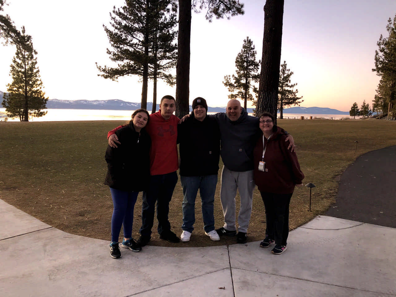 family posing in a park during a JAJF late stage cancer timeout 