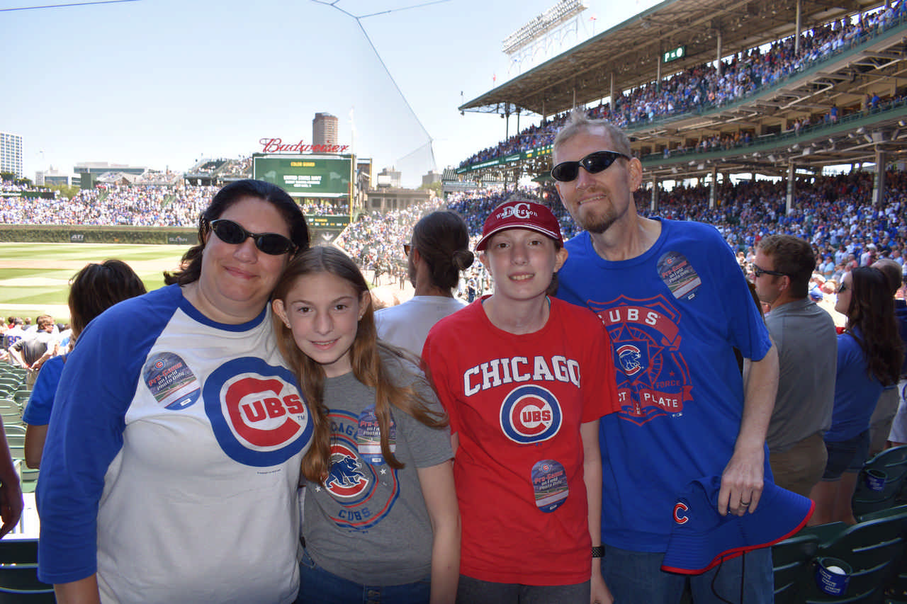 family at Chicago Cubs baseball game during a JAJF late stage cancer timeout 