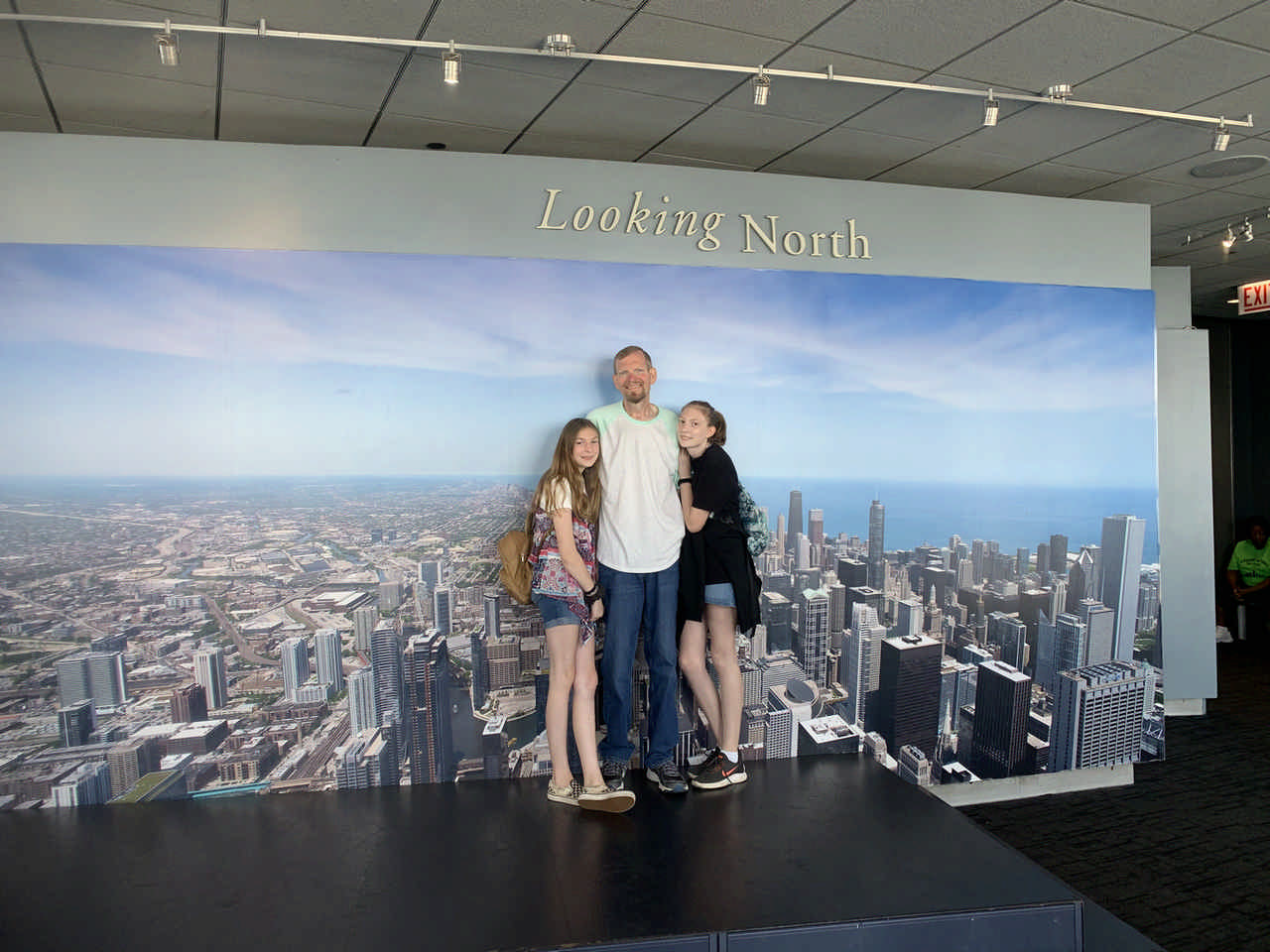 dad and daughters posing in museum during a JAJF late stage cancer timeout 