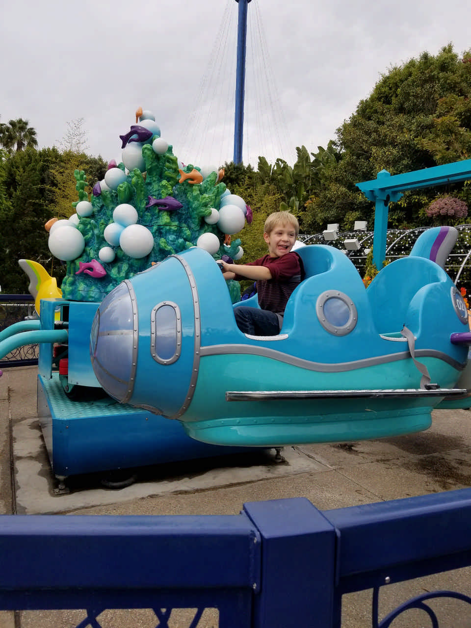 young boy on theme park ride during a Jack and Jill Foundation WOW experience 