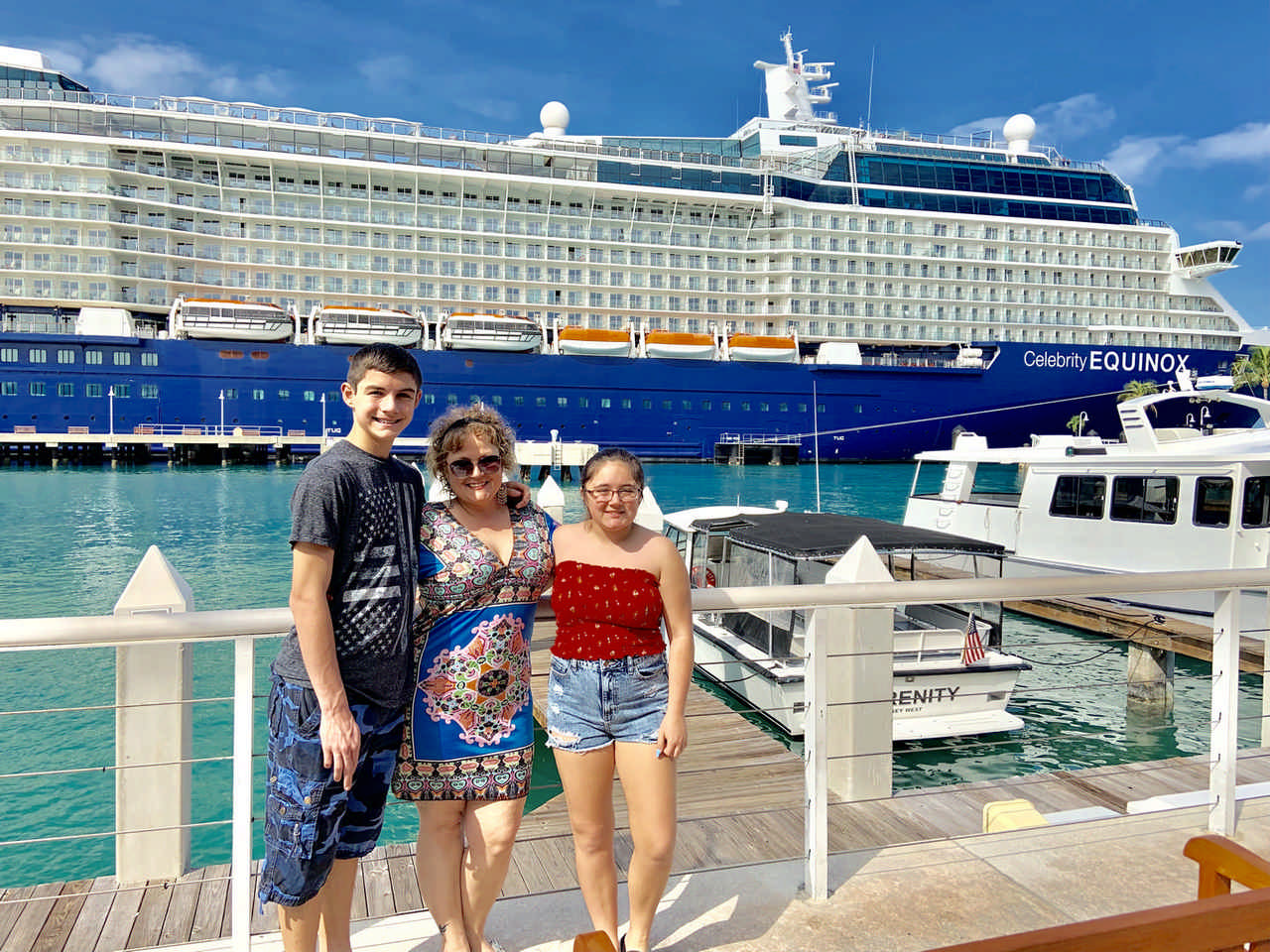 family posing next to cruise ship enjoying a Jack and Jill Foundation WOW experience 