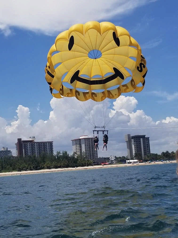 family parasailing enjoying a Jack and Jill Foundation WOW experience 