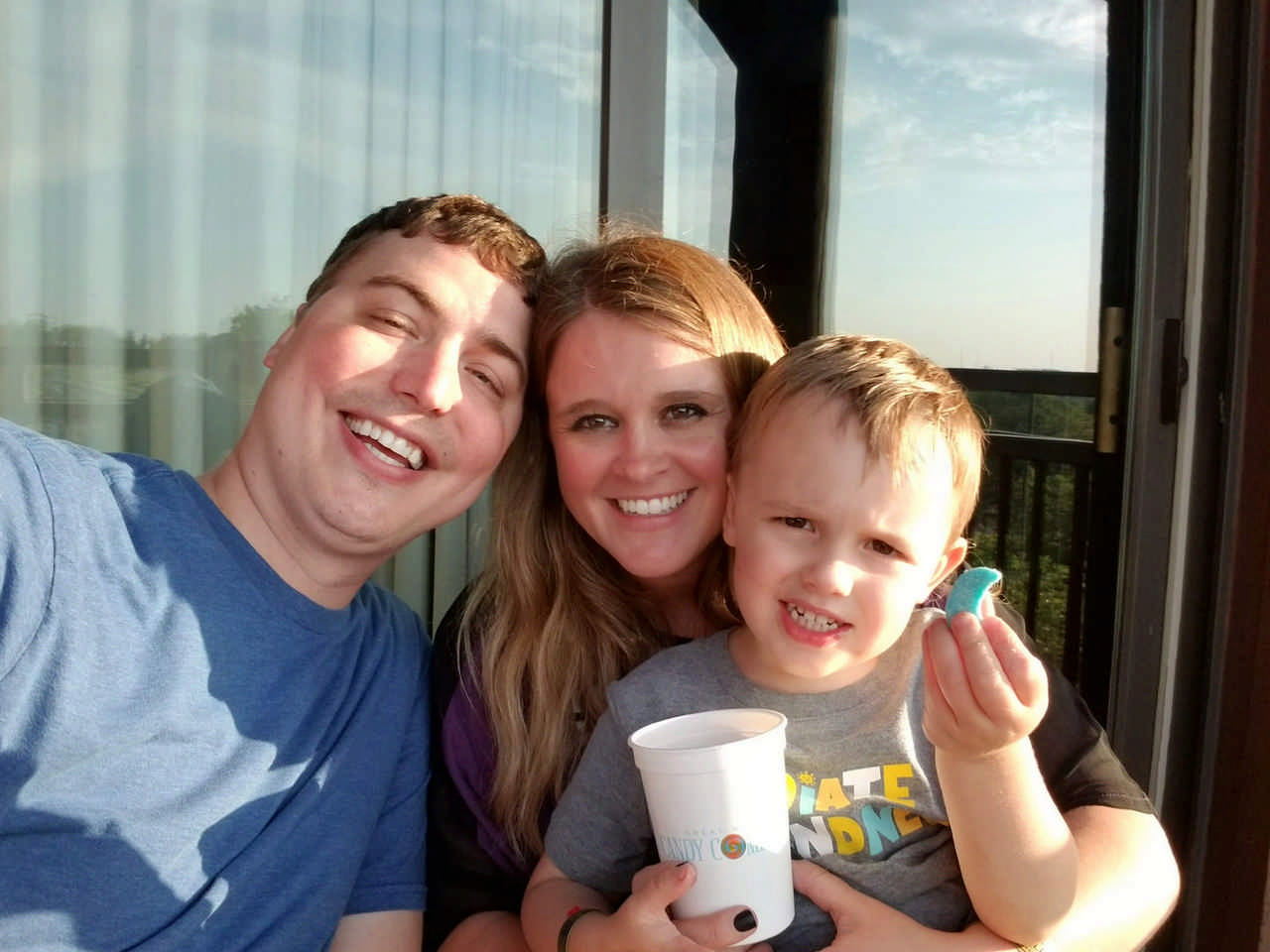 family sitting on hotel lanai enjoying a Jack and Jill Foundation WOW experience 