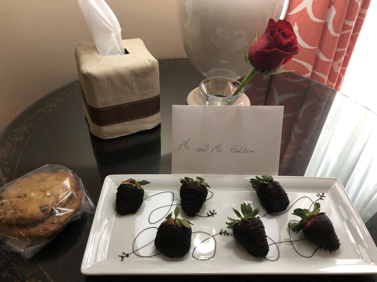 chocolate covered strawberries with a card and rose 