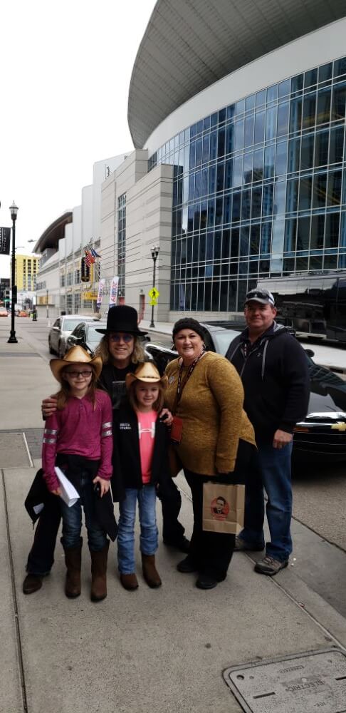 JAJF family outside limousine enjoying The Power of WOW experience 